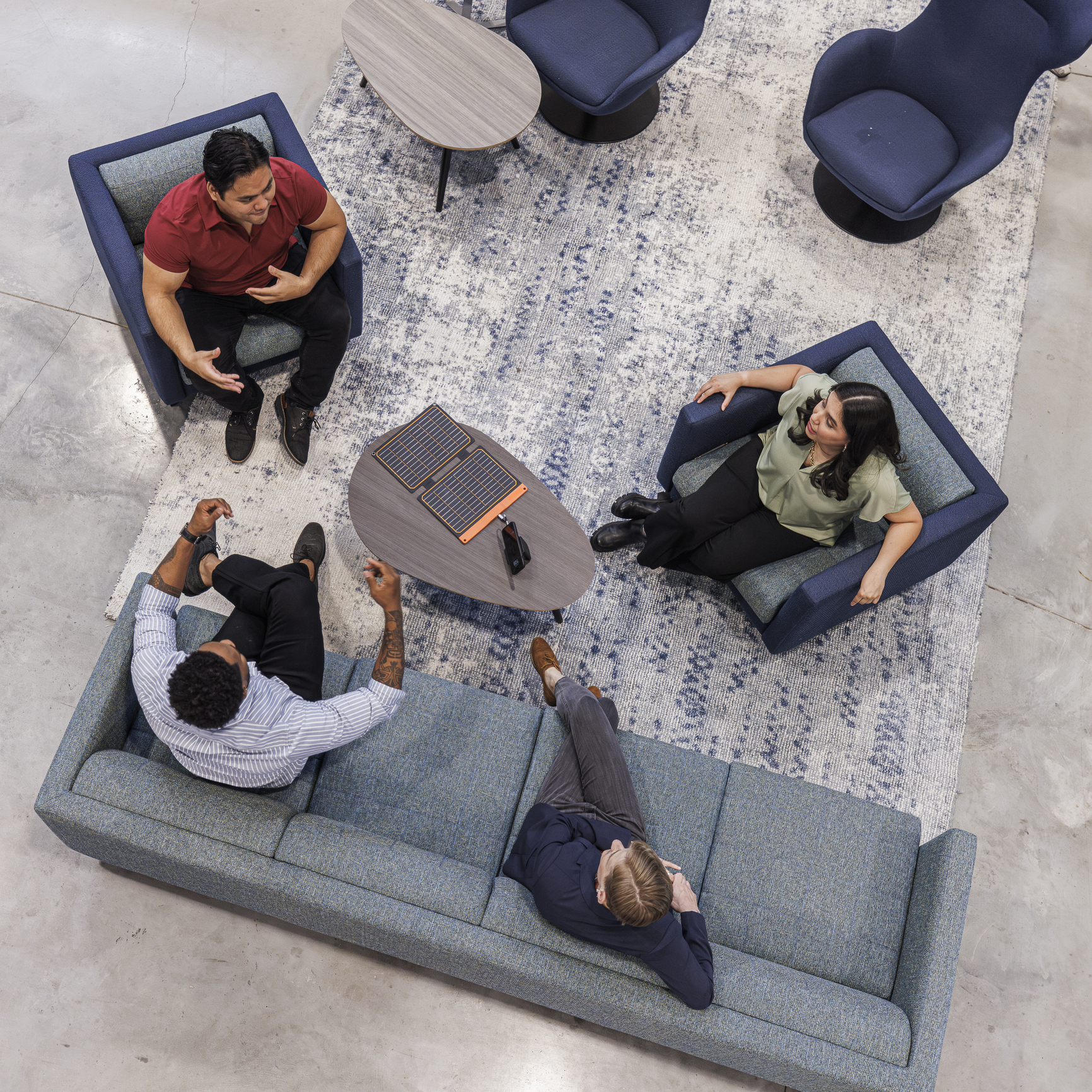 Collaborative workspace with four colleagues