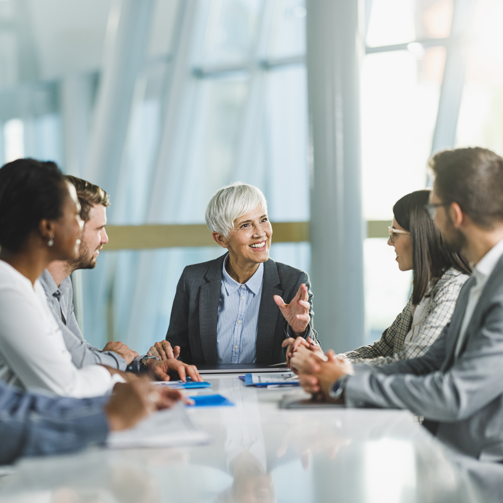 Team discussion around conference table